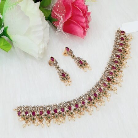 Gorgeous AD and ruby stones necklace with matching earrings.
