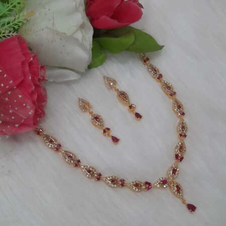 Stylish Gold Plated CZ American Diamond Swirl Necklace (Ruby Red)