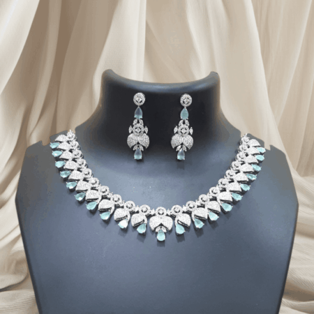 Elegant and Dazzling CZ American Diamond Studded Pastel Green Necklace Set with Earrings