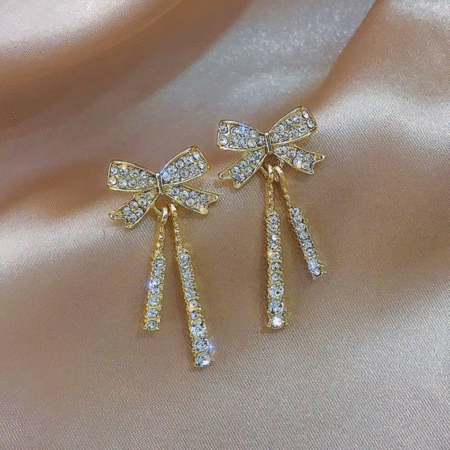 Korean Styled Gold-Plated, Bow-Shaped Dangle Earrings with Zirconia.